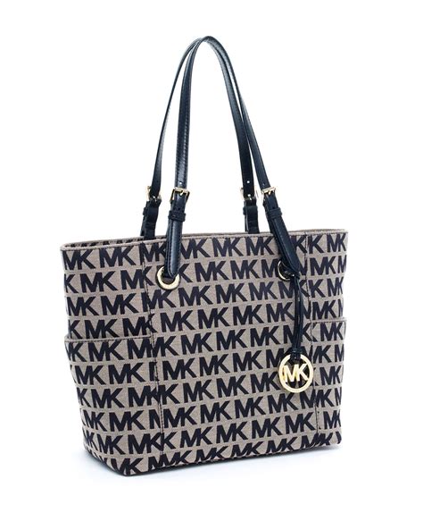 michael kors black and grey monogram tote|Michael Kors brown tote bag.